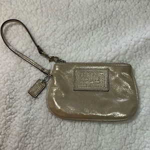 Small gold Coach wristlet, okay condition, vintage